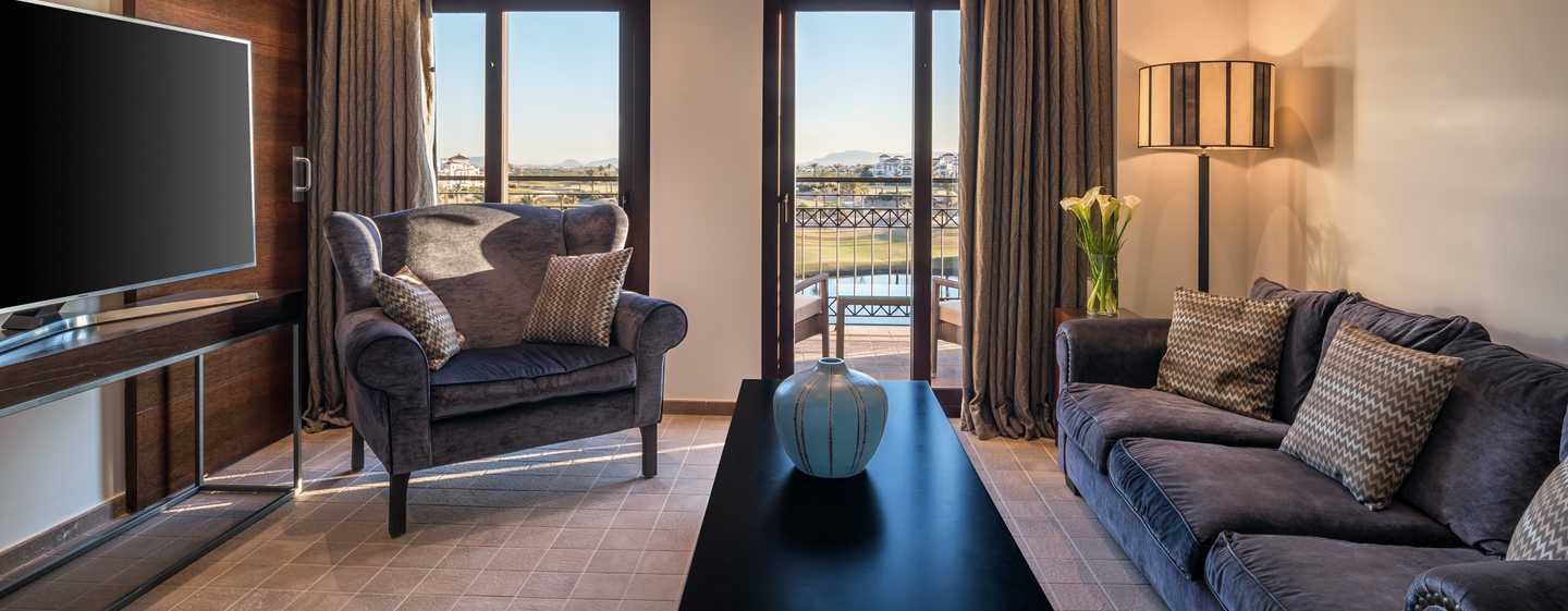 Doubletree By Hilton La Torre Golf Resort Roldan Luaran gambar A suite at the hotel